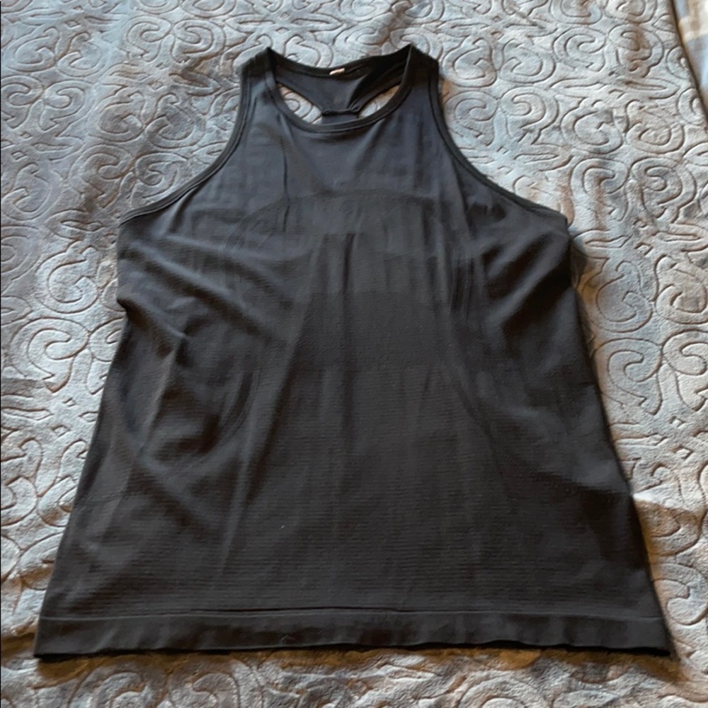 Like New, Size 8 Lululemon tank.
